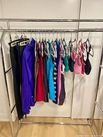 Full garment rack with jacket, leggings, tank tops and bras