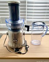 Full view of Breville juicer assembled with pitcher