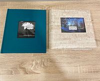 Front view of both photo albums closed