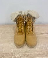 Front view of Timberland Amston Roll-Top wedge boots showing laces and shearling collar