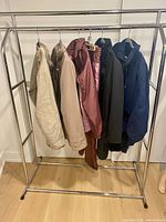 Full rack view showing all outerwear pieces