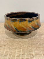 Side view showing glaze pattern and shape