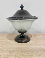 Full view of candle holder showing glass bowl, pedestal base, and lid