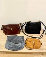 Group shot of all four purses