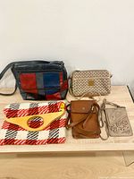 All five bags displayed together on shelf