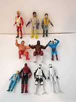 Group shot of ten vintage action figures