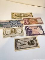 All six banknotes laid out for overview