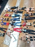 All 20 action figures laid out on floor
