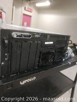 Front angled view of Dell PowerEdge 2900 chassis showing drive bays and cooling fans