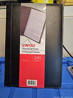 Front of Staples business card case in packaging