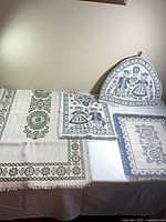 Overview of runners, placemats and tea cozy on table