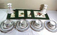 Full lot showing four Silver Birch trios, two Old Country Roses candlesticks, four botanical placemats