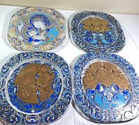 Group shot of all four Rosenthal Bjorn Wiinblad plates