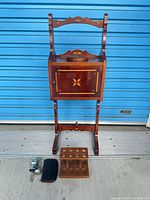 full view of smoker’s table with accessories at base