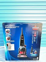 Front of sealed retail box showing product image and branding