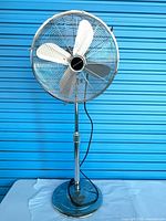 Full view of Bonaire pedestal fan on stand with power cord and base visible
