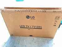 Front of LG cardboard box showing 55-inch LED TV labeling