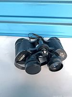 Front view of Skyline binoculars showing lenses and focus wheel