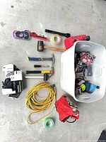 Overall lot layout on floor showing major tools, extension cord and tote