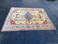 Full view of rug on floor showing overall design and size