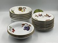 Stack of bowls and saucers showing quantity and pattern