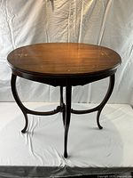 Full view of Edwardian oval side table front left
