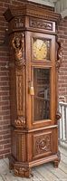 full front view of wooden grandfather clock
