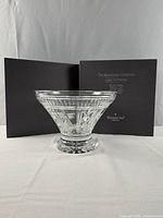 Crystal bowl displayed in front of closed presentation box