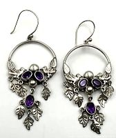 Front view showing amethyst stones, bird and leaf design