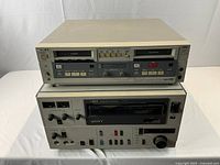 Both Sony recorders stacked, front panels visible