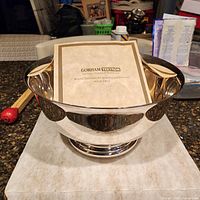 Front view of Gorham silver-plated pedestal bowl with product card