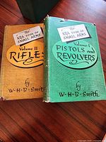 Front view of both volumes showing titles and dust jackets