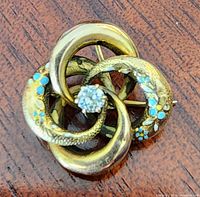 Front view showing diamond center and enamel details