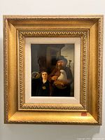 Frontal view of framed oil-on-tin painting