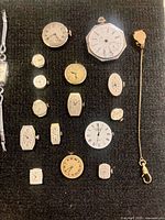 Close-up of group of watch dials/movements