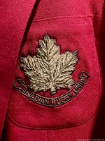 Close-up of embroidered Canadian Rugby crest patch on pocket