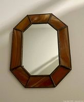 Front view showing entire mirror and stained glass frame