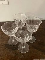 All four Stuart Crystal glasses grouped