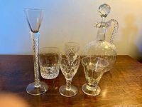 Group shot of jug and five glasses