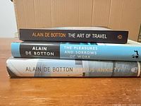 Spines of the three books stacked