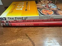 Stack showing spines: The Food of Asia, 80 Thai Curries and Classic South-East Asian Recipes, The Asian Kitchen