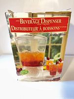 Retail box showing CreativeWare Acrylic Beverage Dispenser graphics and capacity