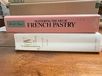 Spines of both hardcover cookbooks