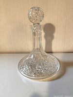 Full view of cut crystal decanter with stopper