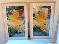 Front view of both framed prints showing imagery and frames