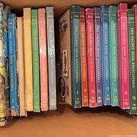 Row of encyclopedia spines showing volumes present