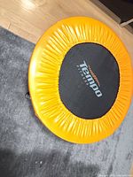 Top view showing orange padded ring and Tempo Fitness logo