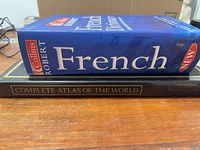 Both books stacked side view