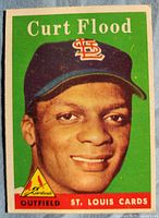 Front of 1958 Topps Curt Flood card showing portrait and team details
