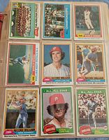 Binder page showing 1980 record breaker, NL championship and World Series subset cards plus Phillies stars Steve Carlton and Mike Schmidt